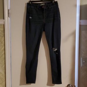 Dark wash mid rise skinny jeans size 9